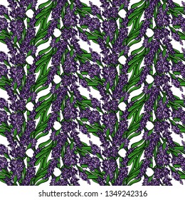 Seamless pattern of purple lavender flowers. Vector background. Perfect for wallpapers, web page backgrounds, surface textures, textile.