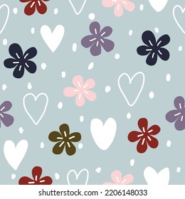 Seamless pattern with purple, red, blue, green, pink flowers, white hearts, abstract hearts and white dots on a green background.