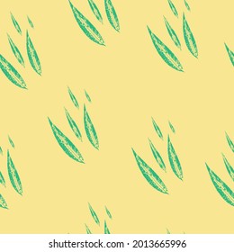  seamless pattern with pussy willow leaves on a yellow trendy background. Vector grunge leaf print. Vector seamless pattern. Printing on fabric, wallpaper, packaging, stylization under a stamp 