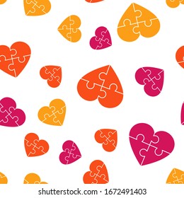 Seamless pattern with a puzzle in the form of a heart. Illustration for Valentine's Day. Romantic pattern for packaging. Background texture.