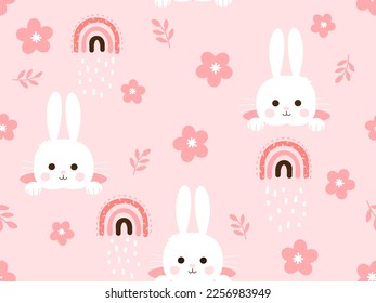Seamless pattern with rabbit bunny cartoons, flower, rainbows and tree branches on pink background vector illustration.