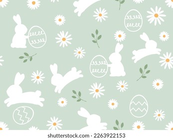 Seamless pattern with rabbit bunny cartoons, Easter eggs, tree branches on green grass background vector illustration. Cute childish print.