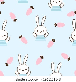Seamless pattern with rabbit cartoons and carrots on blue background vector illustration.