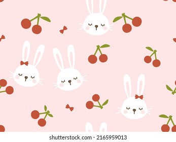 Seamless pattern with rabbit cartoons and cherry fruit on pink background vector illustration.