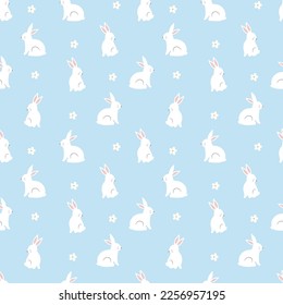 Seamless pattern with rabbit cartoons and daisy flower on blue background