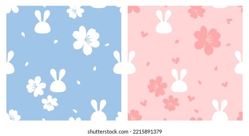 Seamless pattern with rabbit cartoons, flower, flying petals and hand drawn heart on blue and pink background vector illustration. 
