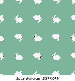 Seamless pattern of rabbit. Domestic animals on colorful background. Vector illustration for textile prints, fabric, banners, backdrops and wallpapers.