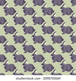 Seamless pattern of rabbit. Domestic animals on colorful background. Vector illustration for textile prints, fabric, banners, backdrops and wallpapers.