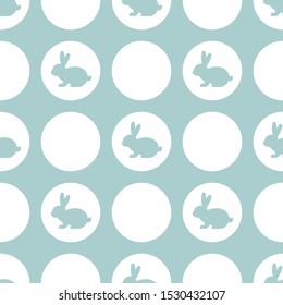 Seamless pattern with rabbits and circles on powder blue background. Decorative Easter or Christmas holiday wallpaper, good for printing. Cute Vector ornament. Flat design