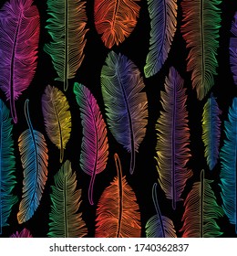 Seamless pattern of rainbow feathers .Vector illustration of tribal style on black.