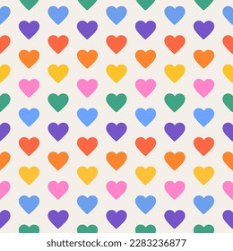 Seamless pattern of rainbow hearts. Multicolor loves print. LGBTQ colors. Abstract geometric pattern. Vector illustration. LGBT flag.