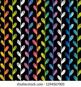 Seamless pattern with rainbow herbal silhouettes on black background