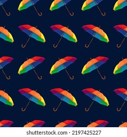 Seamless pattern with rainbow umbrella on blue dark background