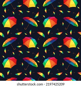 Seamless pattern with rainbow umbrellas on blue dark background