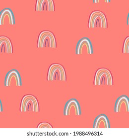 Seamless pattern with rainbows in childs drawing style on pink background