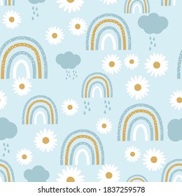Seamless pattern with rainbows, cloud and daisy flower on blue background vector illustration.  