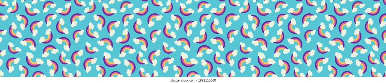 Seamless pattern with rainbows and clouds
