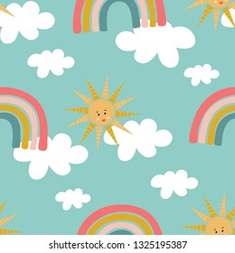 Seamless pattern of rainbows, clouds, and happy suns on a light blue background. Great for textile print, invitations, or packaging. Vector file.