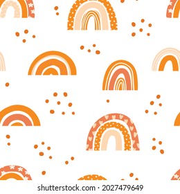 Seamless pattern with rainbows in a modern baby boho style