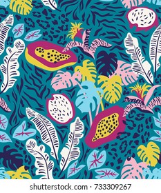 Seamless pattern with rainforest plants and fruits. Trendy abstract tropical design for textiles
