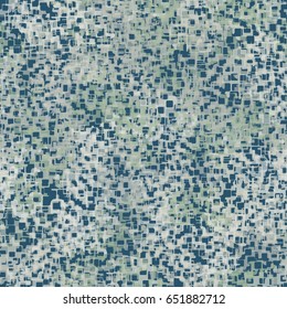 Seamless pattern. Random colored spots. The chaos of color. Fashionable camouflage. Blue-gray and green-gray.