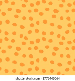 Seamless pattern. Random dots, circles, animal skin. Design for fabric, wallpaper. Irregular random abstract vector texture. Repeating graphic backdrop