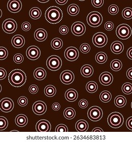 Seamless pattern with random round elements. White pink circular element on dark brown background. Ethnic simple geometric vector illustration. Country style folk ornament for holiday decor