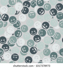 A seamless pattern of randomly arranged multi-colored emoticons.