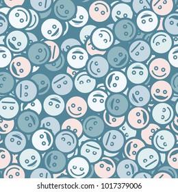 A seamless pattern of randomly arranged multi-colored emoticons.