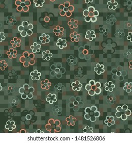 Seamless pattern with randomly arranged primitive images of flowers. Background from small multicolored squares.