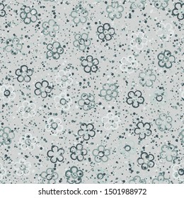 Seamless pattern with randomly arranged primitive images of flowers. Colorful background of small circles. Spring paint.