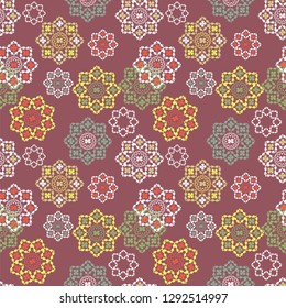 Seamless pattern with randomly placed ornamental compositions on a light burgundy background. Vector illustration