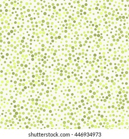 Seamless Pattern of Randomly Scattered Dots of Various Sizes and Shades of Yellowish Green Color.