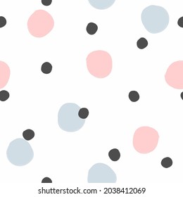 Seamless pattern with randomly scattered round spots painted with a watercolor brush. Simple print for girls. Cute vector illustration.