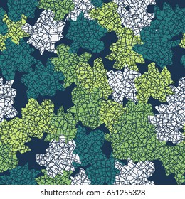 Seamless pattern. Randomly spaced colored spots. A chaotic mesh in the foreground. Fashionable camouflage. White, green, blue.