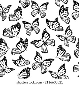 Seamless pattern realistic butterflies in black and white.
