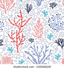 Seamless pattern with red and blue corals and seaweed on white background. Backdrop with tropical aquatic species, sea biodiversity. Flat colorful vector illustration for wallpaper, fabric print.