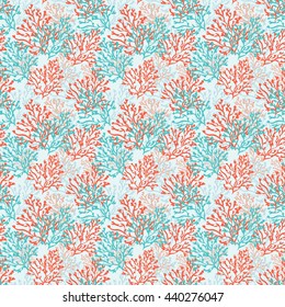Seamless pattern with red and blue corals. Sea background. Vector illustration.