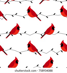 Seamless pattern with red cardinal and branches. Flat design style. Vector background.