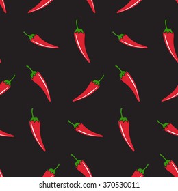 Seamless pattern. Red chili peppers on black background.