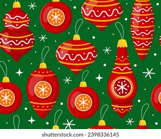 Seamless pattern with red Christmas balls on a green background. New year's toys, decor for christmas tree, snowflakes. Pattern for New Year's wrapping paper, cards, decor, fabric.