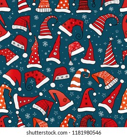 Seamless pattern with red Christmas Santa hats on dark blue background. Vector illustration