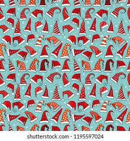 Seamless pattern with red Christmas Santa hats on blue mint background. Vector illustration