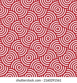 Seamless pattern with red circles and white background.