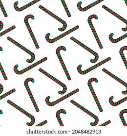 Seamless pattern with red and green christmas candies on white background. Vector image.