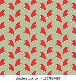 seamless pattern of red hats of Santa Claus
