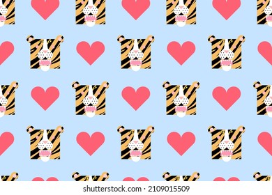 Seamless pattern with red heart and cartoon roar tiger heads wearing a crow on pastel blue background. Festive background or print.