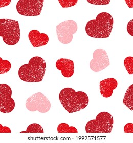seamless pattern red heart with grunge effect for background,greeting card,fabric motif,packaging,cover,event decoration,wallpaper