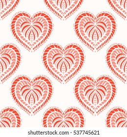 Seamless pattern with red hearts in doodle style. Vector illustration. 