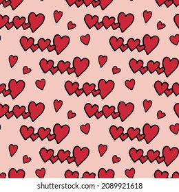 Patrón sin brillo con corazones rojos sobre fondo rosado cálido. Imagen vectorial.